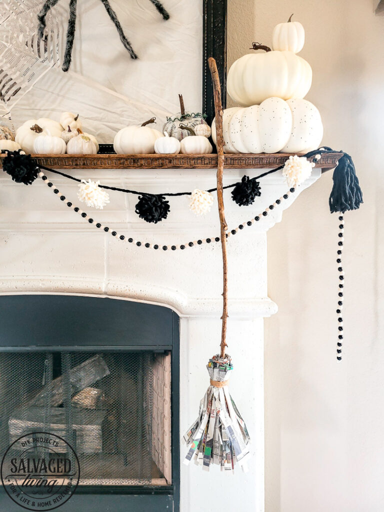 Three Halloween craft ideas to bring your Halloween mantel to life on a budget. These Halloween decor ideas are perfect for the crafty, budget friendly decorator to have a neautral farmhouse style Halloween decor that won't break the bank! Make a paper spider web, newspaper pumpkins and a precious witch's broom. #halloweenDIY #budgetHalloween #Halloweenpapercrafts