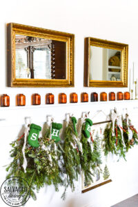 It's Christmas in the dining room, we decorated the peg board with vintage finds and real tree trimmings for an affordable and stylish Christmas feel on a budget. This peg board decorated for Christmas has all the holiday feels for a rustic, neutral Christmas decor vibe. #naturalChristmas #RusticChristmas #vintageChristmas #brownChristmas