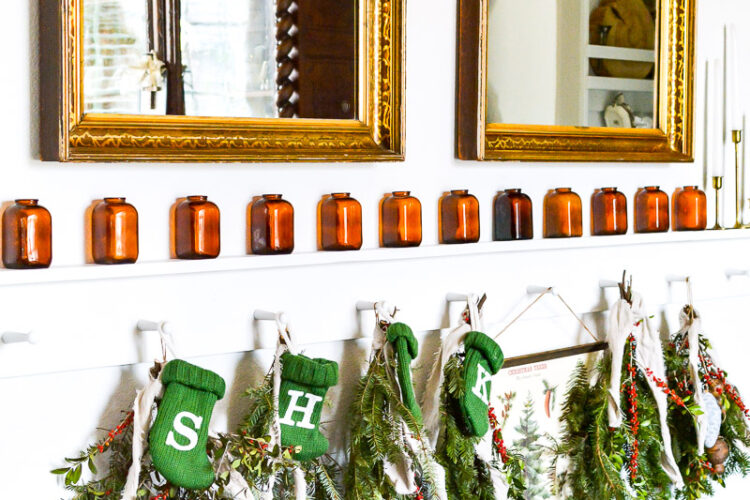 It's Christmas in the dining room, we decorated the peg board with vintage finds and real tree trimmings for an affordable and stylish Christmas feel on a budget. This peg board decorated for Christmas has all the holiday feels for a rustic, neutral Christmas decor vibe. #naturalChristmas #RusticChristmas #vintageChristmas #brownChristmas
