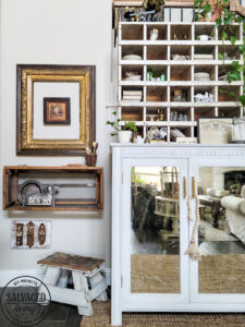 How to decorate a vintage cubby, including an idea list of what to decorate your vintage cubby with! These old sirting cabinets and storage units make for cozy decor that let you show of your favorite treasures and found items! #vintagedecor #howtodecorate #famhousedecoridea