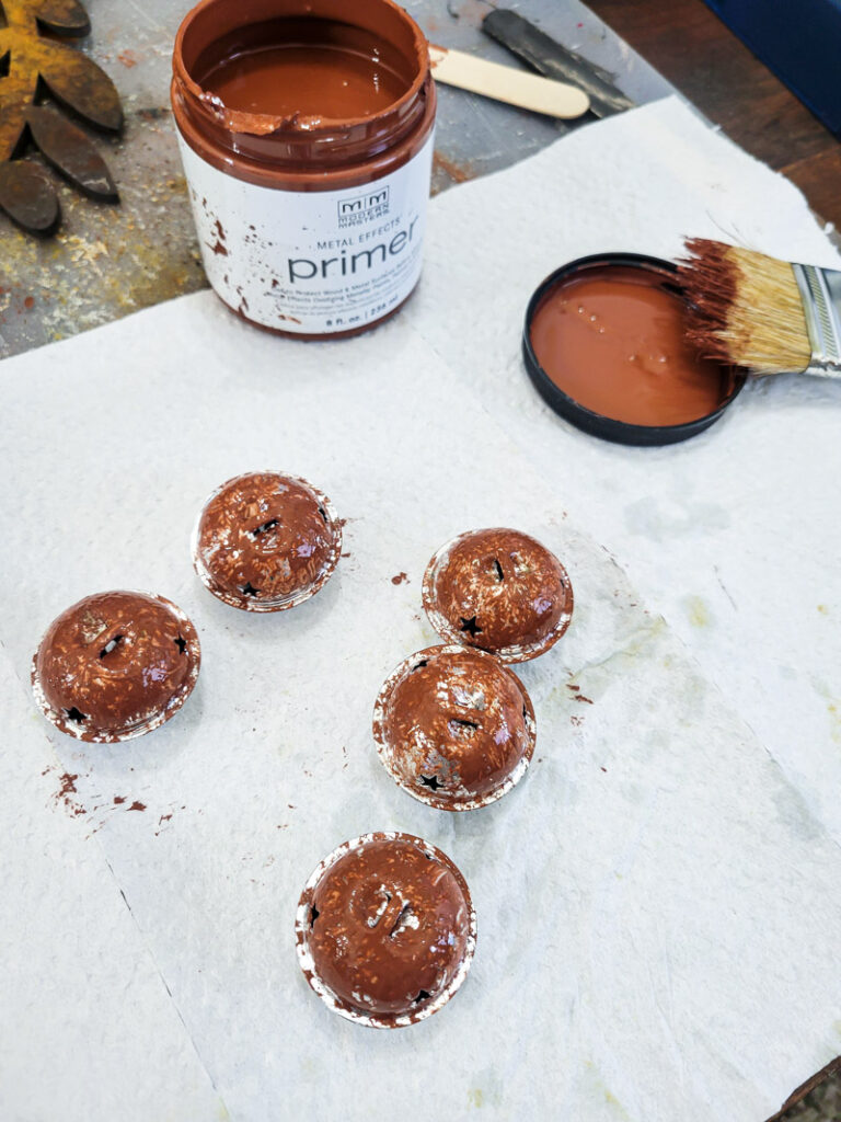 Learn how to rust wood or rust any surface with this amazing product and technique. Rust new things like wood and dollar store bells for gorgeous decor that feels old and vintage. You can make new things old with rust! #DIYdecor #rustychippy #rustfinish #painting technique #paintideas