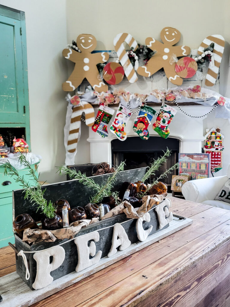 DIY cardboard gingerbread mantel ideas for your budget friendly Christmas decor. Paper crafting for Christmas is easy, gingerbread men and candy canes make this home full of child like joy for the holiday season! #gingerbreadcraft #papercraft #cardboardcraft
