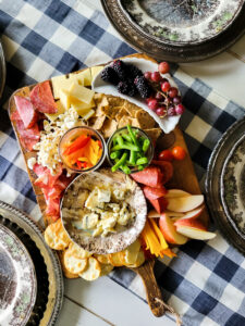 What to put on a January charcuterie board for a creative way to eat charcuterie in the winter months. Charcuterie for all year round is a great way to feed your family or entertain. #wintercharcuterie #januarysnacks #januaryentertainin