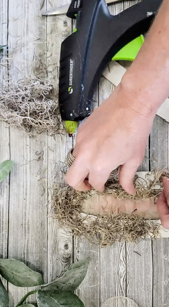 Watch cardboard get a mulligan as we recycle it into beautiful spring and easter decor in a matter of minutes! #easterdecor #springdecor #cardboardrecycle #easydiy #budgetfriendlyeasterdecor