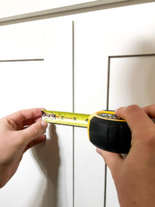 Adding beautiful hardware to your cabinets is easier than you might think... no contractor needed! Just a couple tools, a little time, and a little patience! After reading this, you'll want to add hardware to every cabinet in your home! #cabinethardware #cabinetjewelry #howto #cabinetpulls #cabinetknobs #easilyinstallcabinethardware