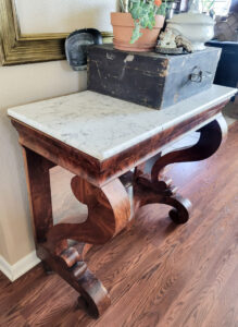 If you're on the hunt for an entryway table, look no further than these marble top entryway tables for a vintage vibe!