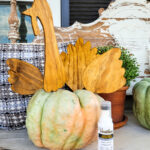 DIY Wood Turkey to add to your fall decor lineup. Add this precious cut-out turkey to a fall plant or pumpkin to make the cutest turkey decor in town. Who knew you could have a turkey mum or a pumpkin turkey in no time!? Plus see the best way to stain your wood crafts with this handy product I found. Honestly, a no-mess wood stain is here and you are gonna love using it on all your stained wood craft projects! #nomessstain #fallDIY #scrollsawproject #turkeydecoridea