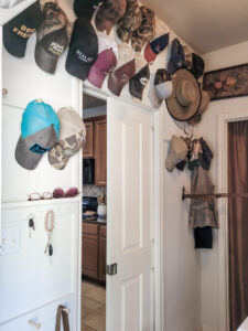 Vintage Style How To Store Baseball Hats Salvaged Living   How To Hang Baseball Caps Vintage Storage In Laundry Room 10 225x300 