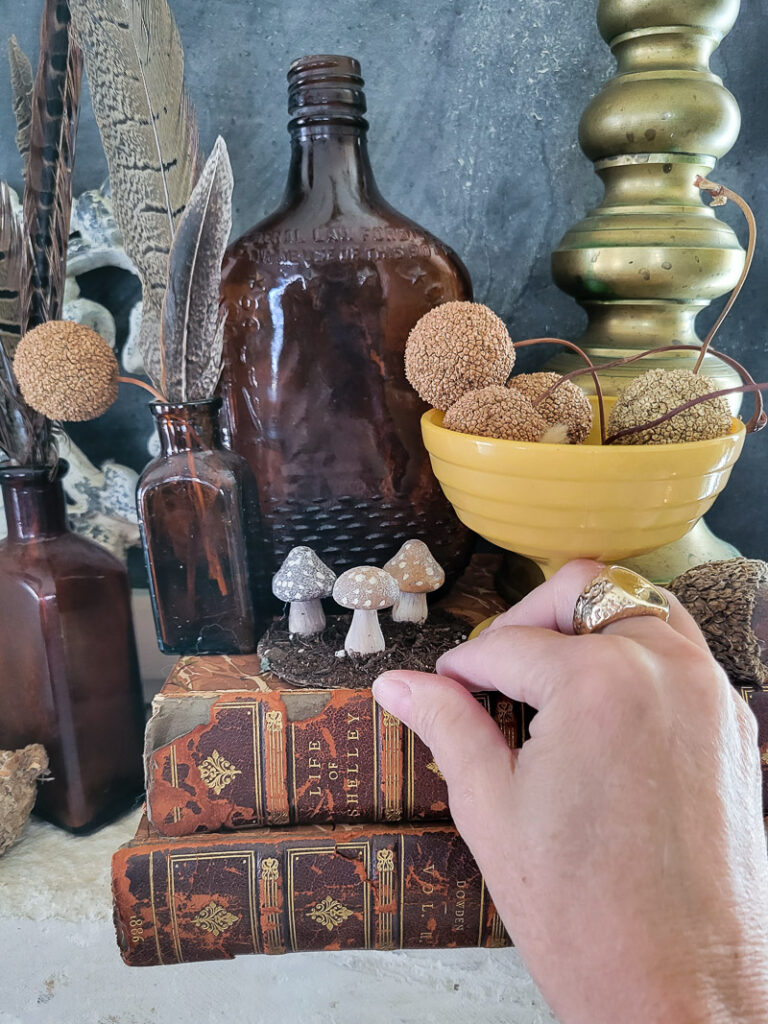Check out this super easy mini mushroom makeover from a dollar store find. Perfect for little decor accents all over your home! #dollarstorediy #mushroomdiy #dollarstoremakeover