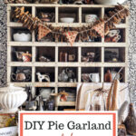 Keep your Fall decor in budget this year with this DIY pie garland made from cardboard and paper! So cute and easy!