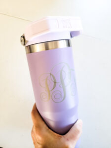 How to engrave a Stanley Tumbler or Yeti Tumbler. Personalized Stanley Quenchers are a great gift or fun to have youth your monogram or 360 design. I will show you how to laser a metal tumbler yourself and the trick to getting your design centered on your tumbler. DIY laser engraved items are a great place to start for a small at home business as well! Get all the laser machine tips and review here! #laserengrave #etchedstanley #personalizedstanley #personalizedyeti #etchedyeti #etchedstanley #monogrammedtumbler #lasermachineproject #beginnerlaserproject